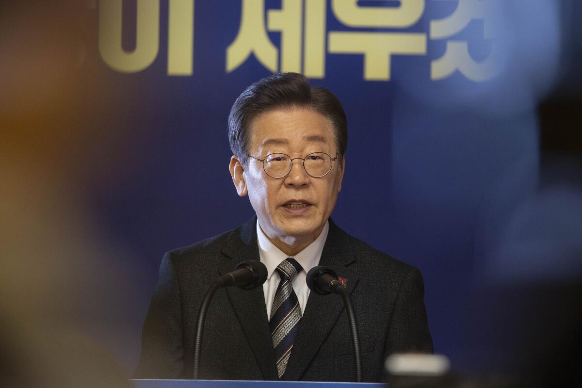 South Korean opposition leader who was stabbed in an attack accuses president of divisive politics