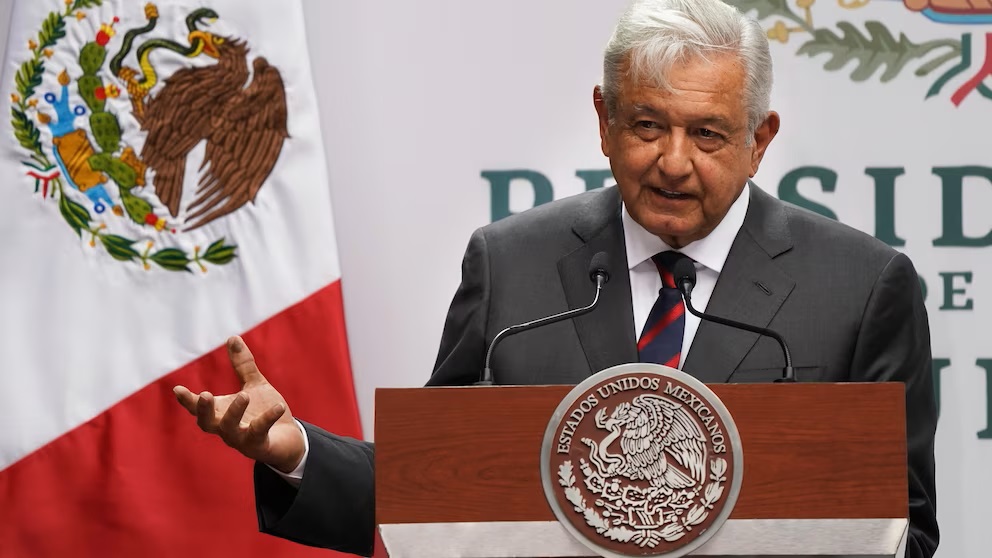 Mexican president defends disclosing a reporter’s phone number, saying the law doesn’t apply to him